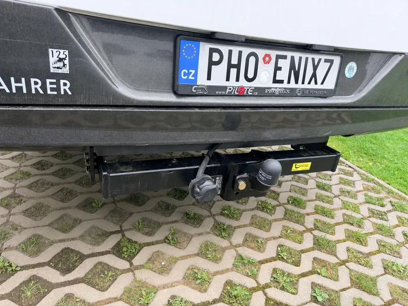 Tow bar and carrier
